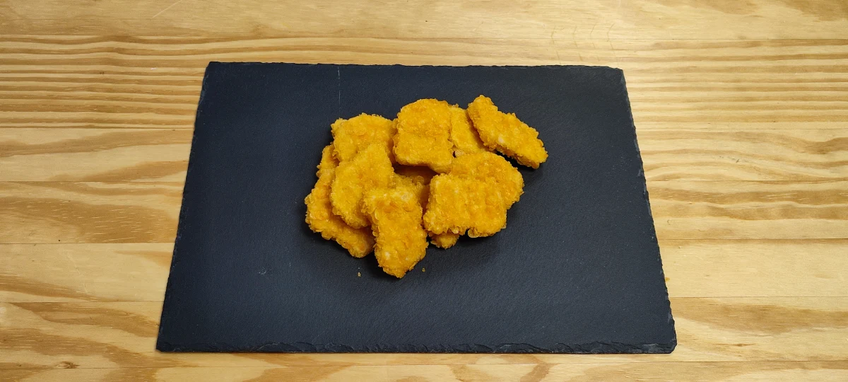 Nuggets de pollo precocinados con rebozado crujiente